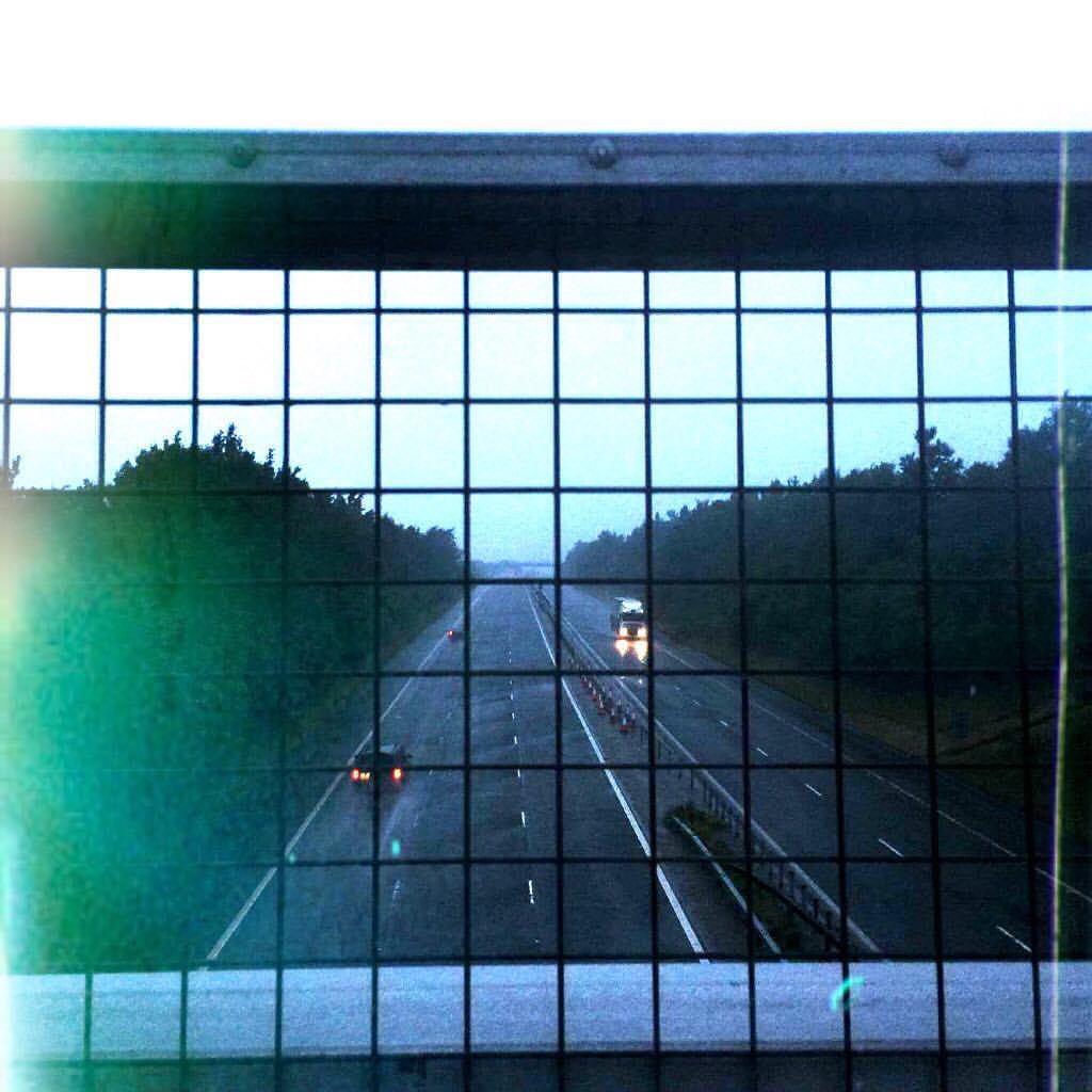 Mornings on a Motorway Bridge (short piece of writing)